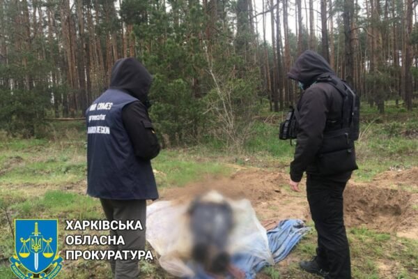 На Харківщині ексгумували тіло чергової жертви росіян (ФОТО)